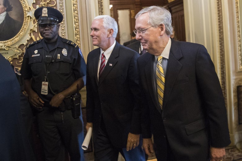 WASHINGTON, DC - JUNE 27: (L to R) Vice President Mike Pence and Senate Majority Leader Mitch McConnell (R-KY) head to a closed-door Senate GOP conference meeting on Capitol Hill, June 27, 2017 in Washington, DC. The Republican-led Senate is trying to pass a health care bill this week. (Photo by Drew Angerer/Getty Images)